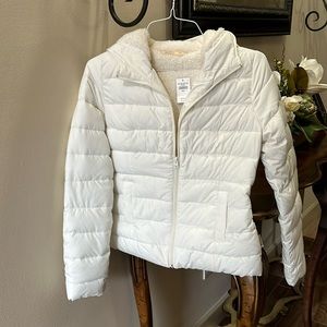 Women’s white puffer jacket, Hollister brand and small new with tags